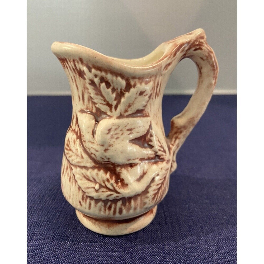 1970’S - Miniature Ceramic burgundy & Cream Embossed Flowers Water Pitcher Decor